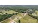 A high aerial view of the new homes and community, with views of the trees at 3284 Hall Rd, Dacula, GA 30019