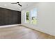 Bright bedroom with a feature wall and natural light at 3284 Hall Rd, Dacula, GA 30019
