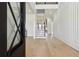Elegant foyer with hardwood floors, high ceilings, and stylish staircase at 3284 Hall Rd, Dacula, GA 30019