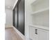 Living room featuring custom millwork, hardwood floors and natural light at 3284 Hall Rd, Dacula, GA 30019