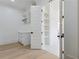 Bright office featuring custom desk, storage and shelving at 3284 Hall Rd, Dacula, GA 30019