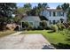 Charming home featuring a well-manicured front yard and a spacious two-car driveway at 6403 Charter Way, Lithonia, GA 30058