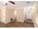 Spacious living room with a ceiling fan and view of entry at 6403 Charter Way, Lithonia, GA 30058