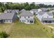 Aerial view of backyard featuring covered patio and view of the surrounding neighborhood at 2260 Cedar Place Ct, Snellville, GA 30078