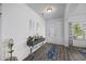 Bright foyer features hardwood floors, stylish decor, and a welcoming ambiance at 2260 Cedar Place Ct, Snellville, GA 30078