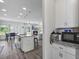 Modern kitchen with granite counters, stainless appliances and ample cabinet space at 2260 Cedar Place Ct, Snellville, GA 30078