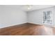 Spacious bedroom with hardwood floors, large windows, and a ceiling fan at 3187 Abbeywood Dr, Decatur, GA 30034