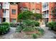 Condo courtyard featuring brick and landscaped garden at 1041 State Nw St # 23, Atlanta, GA 30318