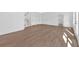 Open living room featuring hardwood floors, white walls, and staircase with bright natural light at 19 Bridgemill Dr, Douglasville, GA 30134