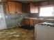 A bright kitchen with wood cabinets and laminate flooring at 1235 Westboro Sw Dr, Atlanta, GA 30310