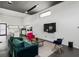 Bright living room featuring hardwood floors, modern furniture, and an adjacent kitchen area at 175 Moreland Se Ave, Atlanta, GA 30316