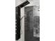 Modern shower with black subway tile, sleek fixtures, and a rainfall shower head at 175 Moreland Se Ave, Atlanta, GA 30316