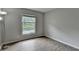 Bedroom with modern lighting and hardwood style floors at 3650 Ashford Dunwoody Rd, Ne, #923, Atlanta, GA 30319