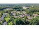 Spacious aerial view of a residential area with lush green trees and well-maintained homes at 3802 Abbott Ln # 14, Powder Springs, GA 30127