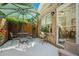 Inviting back patio with outdoor seating, lush foliage, and a well-kept brick exterior at 3802 Abbott Ln # 14, Powder Springs, GA 30127