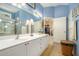 Elegant bathroom with double vanity, lots of light, a walk-in shower, and neutral decor at 3802 Abbott Ln # 14, Powder Springs, GA 30127