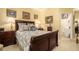 Comfortable main bedroom with a decorative bed, soft lighting, and stylish furnishings at 3802 Abbott Ln # 14, Powder Springs, GA 30127
