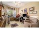 Bright office area with neutral decor, lots of seating, and large window at 3802 Abbott Ln # 14, Powder Springs, GA 30127