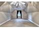 Attic bedroom with slanted ceilings, neutral paint, and natural light at 3871 River Mansion Dr, Peachtree Corners, GA 30096
