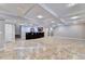 Spacious finished basement with wet bar area and open floor plan at 3871 River Mansion Dr, Peachtree Corners, GA 30096