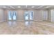 Spacious room with tile floor and double doors leading to backyard at 3871 River Mansion Dr, Peachtree Corners, GA 30096