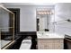 Well-lit bathroom with a shower, and vanity, providing a functional and sleek design at 3871 River Mansion Dr, Peachtree Corners, GA 30096