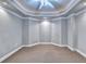 This bedroom showcases decorative trim and ceiling fan, creating a serene, comfortable space at 3871 River Mansion Dr, Peachtree Corners, GA 30096