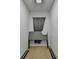 A small bedroom with carpet, headboard, and curtains, perfect for a minimalist lifestyle at 3871 River Mansion Dr, Peachtree Corners, GA 30096