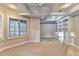 Cozy bedroom showcases bay windows, coffered ceilings with a fan, and built-in shelving at 3871 River Mansion Dr, Peachtree Corners, GA 30096