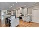 Spacious kitchen featuring sleek cabinetry, stainless steel appliances, and an open floor plan at 3871 River Mansion Dr, Peachtree Corners, GA 30096