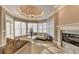 Bright living room featuring marble fireplace, modern ceiling, and large windows at 3871 River Mansion Dr, Peachtree Corners, GA 30096