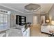 Bright living room offering comfortable seating, neutral walls and high ceilings at 3871 River Mansion Dr, Peachtree Corners, GA 30096