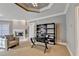 Office/den featuring fireplace, recessed lights, shelving, and carpeting at 3871 River Mansion Dr, Peachtree Corners, GA 30096