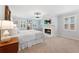 Serene main bedroom with a fireplace, cozy carpet, and ample natural light at 4250 Green Ridge Ne Dr, Marietta, GA 30062