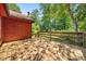 Wood back deck, perfect for outdoor dining and relaxation, overlooking lush greenery at 2945 Cardinal Lake Cir, Duluth, GA 30096