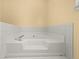 Large bathtub surrounded by white tiles at 2945 Cardinal Lake Cir, Duluth, GA 30096