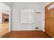 Inviting entryway with brick floors, decorative glass block window, and solid wood door at 2945 Cardinal Lake Cir, Duluth, GA 30096