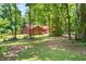 Charming single-Gathering home with mature trees creating a private, secluded yard at 2945 Cardinal Lake Cir, Duluth, GA 30096