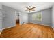 Spacious bedroom with hardwood floors, ceiling fan and closet at 2945 Cardinal Lake Cir, Duluth, GA 30096