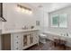 Stylish bathroom with modern vanity, elegant mirrors, soaking tub, and hardwood floors, exuding comfort at 4200 E 166 Hwy, Carrollton, GA 30116