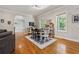 Elegant dining room with hardwood floors, arched doorway, and stylish decor at 4200 E 166 Hwy, Carrollton, GA 30116
