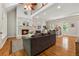 Cozy living room with a fireplace and open layout to the dining area at 4200 E 166 Hwy, Carrollton, GA 30116