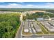 An aerial view of a neighborhood showcasing townhomes and tree-lined streets at 1150 Buice Lake Pkwy, Acworth, GA 30102