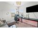 Modern bedroom with a large window, desk, and chair, ideal for a home office or study space at 1150 Buice Lake Pkwy, Acworth, GA 30102