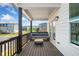 Relaxing covered patio with comfortable seating and views of the community at 1150 Buice Lake Pkwy, Acworth, GA 30102