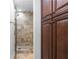 The bathroom has a glass-enclosed shower, and built-in cabinets at 1421 Peachtree Ne St # 310, Atlanta, GA 30309