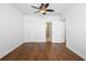 The bedroom features hardwood floors, white walls, and doors to the closet and bathroom at 1421 Peachtree Ne St # 310, Atlanta, GA 30309
