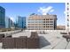 Rooftop deck featuring lounge seating and scenic city views in a walkable neighborhood at 1421 Peachtree Ne St # 310, Atlanta, GA 30309