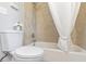 Relaxing bathroom features a tub with shower, providing a comfortable washing experience at 1084 Fairburn Nw Rd, Atlanta, GA 30331