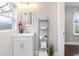 Bright bathroom with a sink, stylish fixtures, and shelving for storing your towels and other items at 1084 Fairburn Nw Rd, Atlanta, GA 30331